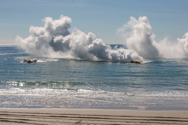 Amphibious assault vehicles with the United States military, Australian Defence Force and Japan Self-Defense Force simulate a combined force entry assault operation as a part of Talisman Sabre 2019 on Langhams Beach, Shoalwater Bay Training Area. (U.S. Marine Corps photo by Lance Cpl. Kealii De Los Santos)