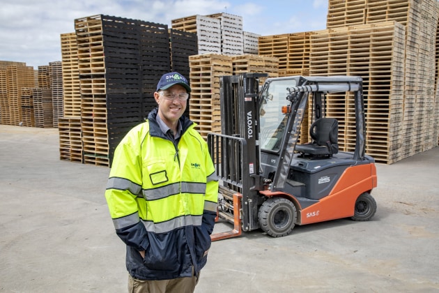Smart Recycling managing director Ward Petherbridge and one of the Toyota 8FBN 2.5-tonne electric forklifts.