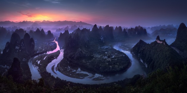 &copy; Jesus M. Garcia, Spain. Open Award Winner &ndash; Nature/Landscape. Good Morning Damian Shan, China.
"This photo was taken in China. We get up early about 3am for climbing at the top of the mountain, between trees and vegetation. After 1 hour of climbing and carry all the photographic gear we arrived at the top of the mountain. This image is the result of 7 vertical stitched images. Nowadays when i see this photo, I remember a great effort to get this picture, but i remember too&hellip;one of the most beautiful sunrises of my life."
