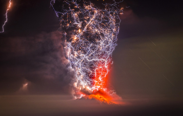 Fire and Lightning create a terrifying spectacle of fury during the eruption of Calbuco Volcano in Chile, awake after 40 years of inactivity. 1st Prize - General. &copy; Francisco Negroni Rodriguez (Chile).