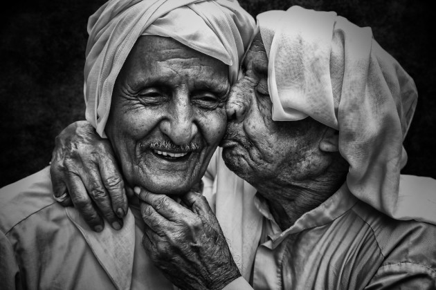 The touching embrace of two old friends in Manama reveals that through the long years of a lifetime, even age cannot diminish the simple feeling of happiness. First Prize - Happiness. &copy; Hameed Husain Isa (Bahrain).