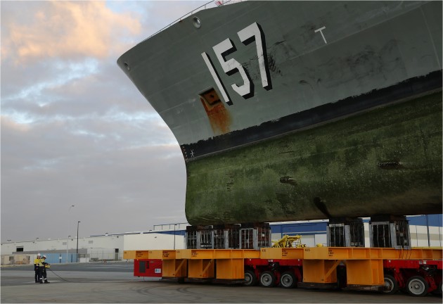 HMAS Perth moves toward its final position on the hard stand in preparation for Intermediate Maintenance Availability (IMAV) 06 docking at the Australian Marine Complex Common User Facility at Henderson in Western Australia in 2015. (Defence)