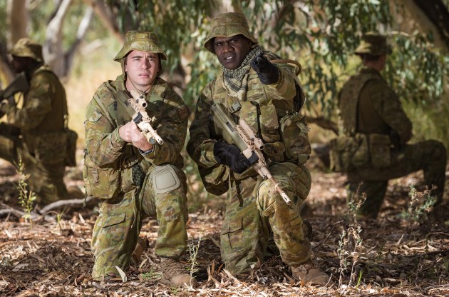 A Lance Corporal (right) briefs a Private from the North-West Mobile Force. (Defence)