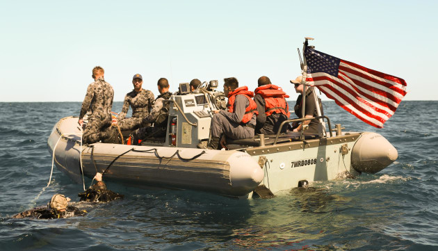 Divers from Royal Australian Navy's Clearance Diving Team One conduct dive operations alongside the United States Navy. Credit: Defence