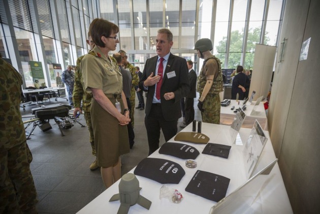 A DefendTex representative talks to Head of Land Capability MAJGEN Kathryn Toohey at Army Innovation Day 2017. Credit: Defence