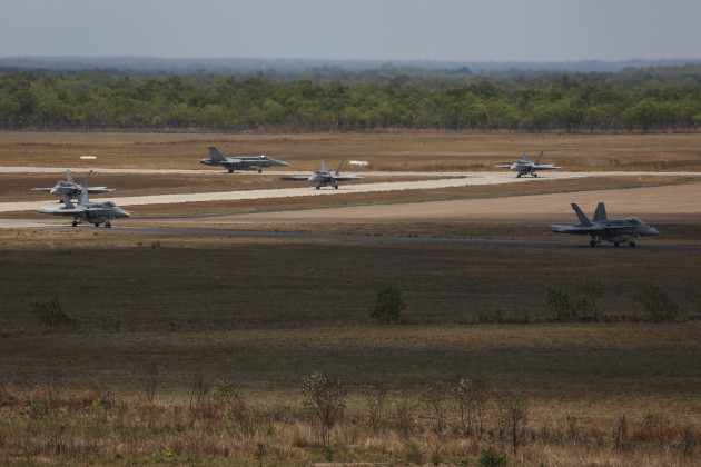 Six No 75 Squadron F/A-18 Hornets taxi after landing at RAAF Base Tindal upon completion of duties for Exercise Elang AUSINDO 17, where they were based in Darwin.