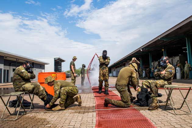 Soldiers of 1st Combat Engineer Regiment takes the trainees through a Chemical Biological Radiological Nuclear (CBRN) decontamination training during a visit by the Army Indigenous Development Program to Robertson Barracks last year. 
Defence