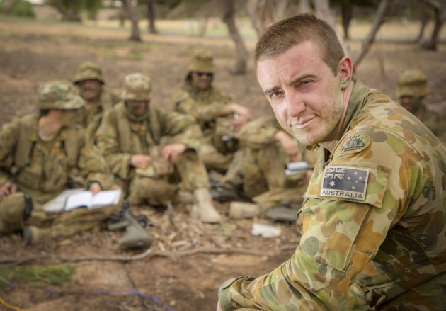 Officer Cadet Asher Price from the Army Reserves conducts a field briefing for a section attack during a training exercise out of the Murray Bridge Training Area in SA. Credit: Defence