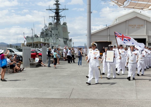 Commanding Officer HMAS Hobart, Captain John Stavridis, RAN, leads his ship's company from Princes Wharf in a Freedom of Entry march conducted in it's namesake port of Hobart on 10th February. Credit: Defence