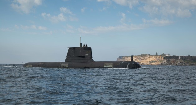 HMAS Waller sails through Sydney Harbour as she prepares to berth at Fleet Base East, Sydney. 
Defence