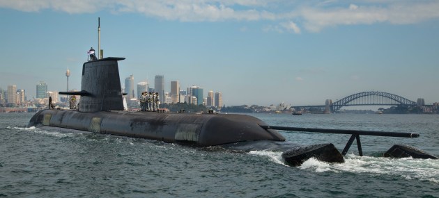 HMAS Waller sails through Sydney Harbour as she prepares to berth at Fleet Base East, Sydney. 
Defence