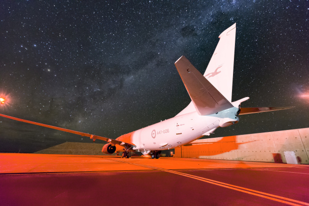 The spectacular Milky Way dominates the night sky as a No. 11 Squadron P-8A Poseidon sits on the hardstand at RAAF Base Learmonth. (Defence)