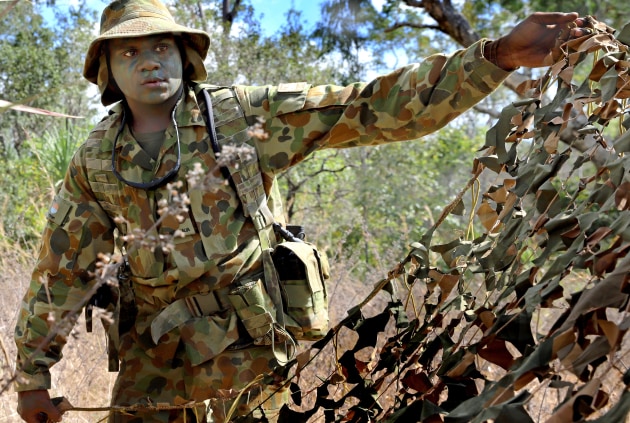 A Private of the 51st Battalion, Far North Queensland Regiment (51 FNQR), helps construct an observation post during a Patrolman&rsquo;s Course. (Defence)