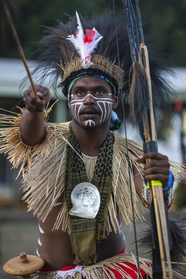 An Australian Army soldier from 51st Battalion, Far North Queensland Regiment, performs a traditional Sarpeye Dance following a parade celebrating the formation of Regional Force Surveillance Group, in Darwin. (Defence)