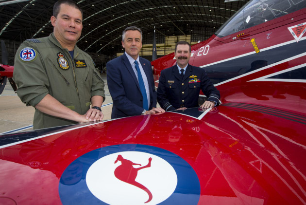 The Minister for Defence Personnel and Veterans' Affairs Darren Chester (centre), with Chief of Air Force, Air Marshal Leo Davies  (right) and Group Captain Dennis Tan, Officer Commanding Air Force Training Wing (left), during inspection of the new colour scheme of the PC-21 aircraft at Fairbairn.
Defence