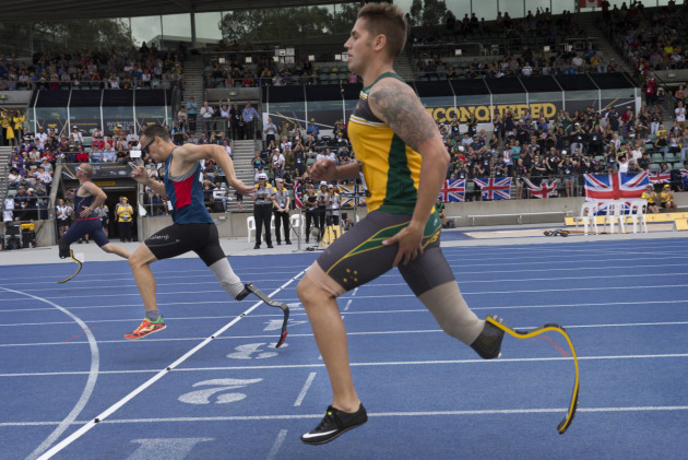 Australian Invictus Games 2018 competitor and Australian Army soldier Private Nathan Whittington crosses the finish line in the Men&rsquo;s IT1 200m Final during the Games at Sydney Olympic Park. Defence