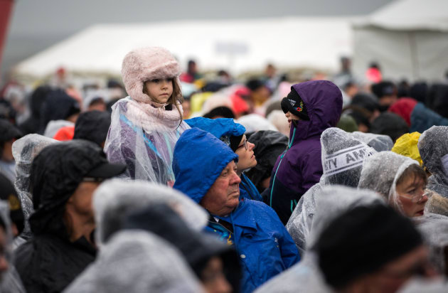 Members of the public brave the cold weather during the commemorative service for the centenary of the First World War Armistice, Australian National Memorial, Villers-Bretonneux, France. Defence