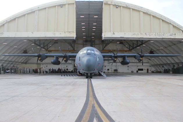 A No. 37 Squadron C-130J Hercules in front of a hangar at Andersen Air Force Base in Guam, prior to the Push Ceremony for Operation Christmas Drop 18. Defence