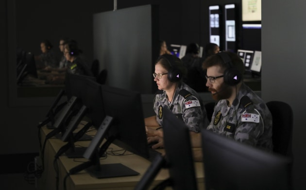 Trainees utilise the newly built Communications Centre Simulator at the Defence Force School of Signals - Maritime Wing at HMAS Cerberus. Credit: Defence