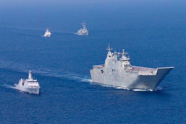 HMA ships Canberra and Newcastle sail in company with Sri Lankan Navy ships during IPE19. Credit: Defence