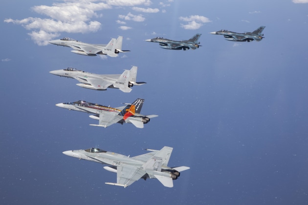 RAAF F/A-18A Hornets from No. 77 Squadron fly in formation with Koku-Jieitai fighter jets including the F-15J and F-2A during Exercise Bushido Guardian conducted out of Chitose Air Base in Japan. (Defence)