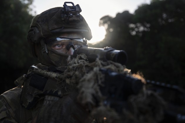 Private Mattew Blake from the 2nd Battalion, Royal Australian Regiment, aims his EF88 rifle during a reconnaissance patrol at the Cowley Beach Training Area, North Queensland. (Defence)
