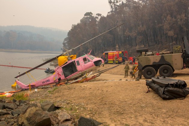 An Australian Army Heavy Recovery Vehicle is used to recover a NSW Rural Fire Service-contracted helicopter that ditched in the Ben Boyd Reservoir near Eden, NSW. Photo: Sergeant Bill Solomou