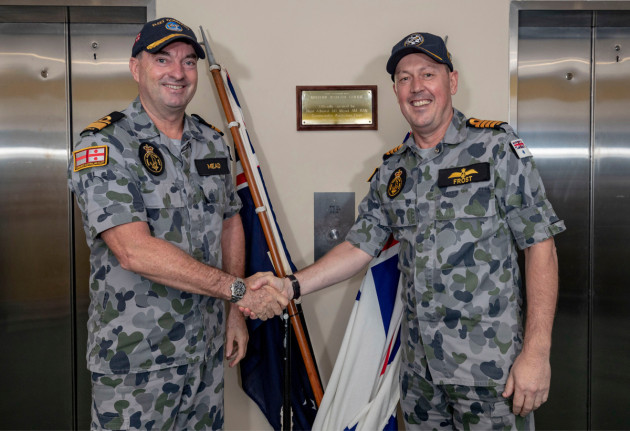 Commander Australian Fleet, Rear Admiral Jonathan Mead, AM, RAN and Director RAN Test & Evaluation Authority, Captain Frost, RAN, unveil a commemorative plaque at the official opening. (Defence)
