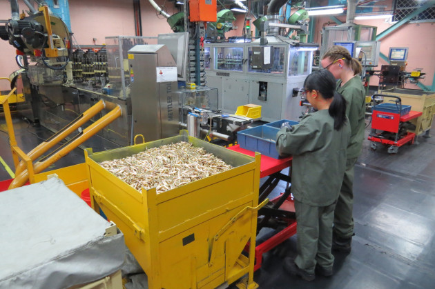 Thales Australia employees complete final assembly of 5.56mm ball ammunition on the production line at Benalla, VIC. 
Credit: Thales