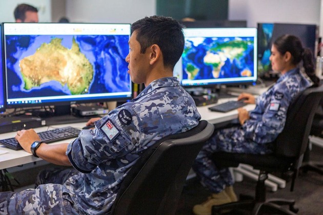 Corporal Yasunari Fujimura and Aircraftwoman Amandeep Kaur, from Distributed Ground Station &ndash; Australia, prepare for the 2020 Exercise Coalition Virtual Flag. (Defence/ Leading Aircraftwoman Jacqueline Forrester)