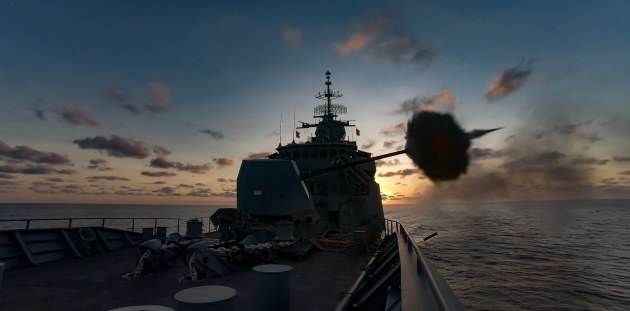 HMAS Ballarat conducts a calibration firing of its five-inch gun port side. 

Credit: Defence