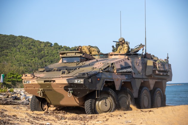 Personnel from the 2nd/14th Light Horse Regiment (Queensland Mounted Infantry) test the Boxer CRV on the beach during Exercise Sea Wader 2020. (Defence)