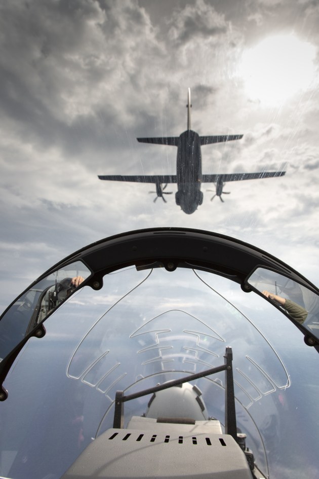 A PC-21 flies in formation with a C27-J Spartan off the coast of Newcastle. (Supplied)
