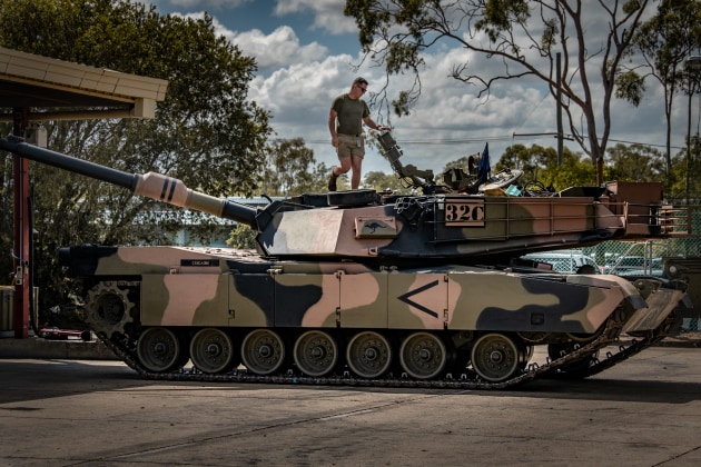 Australian Army Trooper Hayden Neal, from the 2nd/14th Light Horse Regiment, oils the barrel of an M1A1 and does a final check over during routine maintenance at Gallipoli Barracks, Brisbane. (Defence)