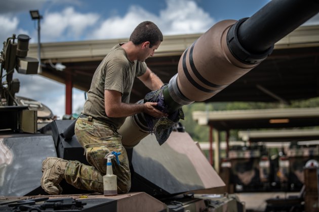 Australian Army Trooper Hayden Neal, from the 2nd/14th Light Horse Regiment, oils the barrel of an M1A1 and does a final check over during routine maintenance at Gallipoli Barracks, Brisbane. (Defence)