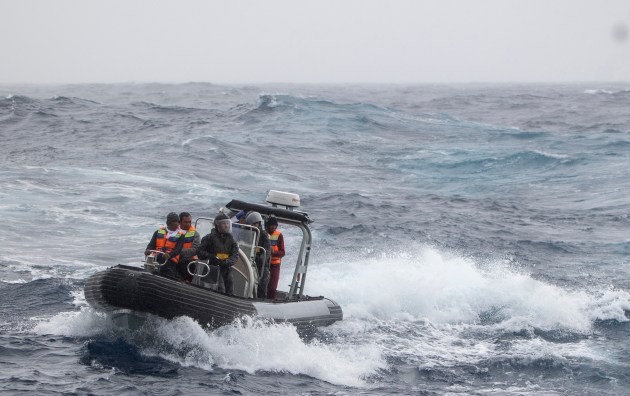 HMAS Anzac's Rigid-Hulled Inflatable Boat (RHIB) transports rescued Indonesian fisherman from a Japanese commercial fishing vessel. (Defence)