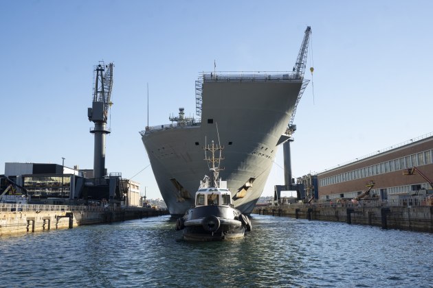 HMAS Adelaide enters the Captain Cook Graving Dock for maintenance at Fleet Base East in Sydney. (Image: Defence)