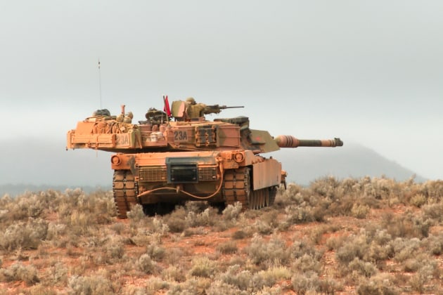 An M1A1 Abrams Main Battle Tank, from the 1st Armoured Regiment, fires its main armament during live-fire training at Cultana Training Area, South Australia. Credit: Defence