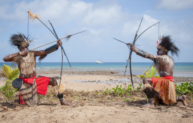 Sarpeye Warriors, Private Leo Akriba (left) and Private Jerry Anau (right) from Charlie Company, 51st Battalion, Far North Queensland Regiment, celebrate the Coming of the Light on Darnley Island, in the Torres Straits. (Defence)