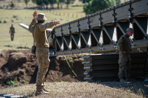 2nd Combat Engineer Regiment constructs the Medium Girder Bridge at Gayndah, Queensland. (Defence)