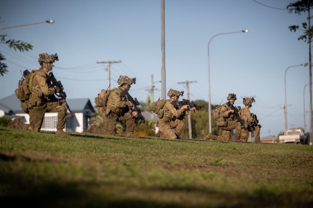Australian Army soldiers provide security during a simulated firefight in Ingham, Queensland, as part of Exercise Talisman Sabre 2021. (Defence)