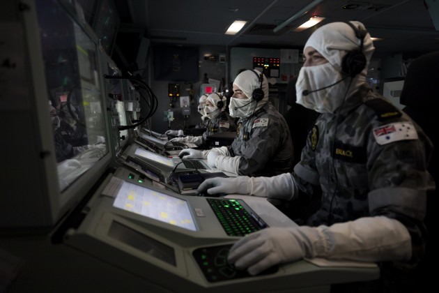 Combat Systems Operators and Electronic Warfare sailors in the operations room onboard HMAS Anzac during Exercise Bersama Gold 21.
Credit: Defence
