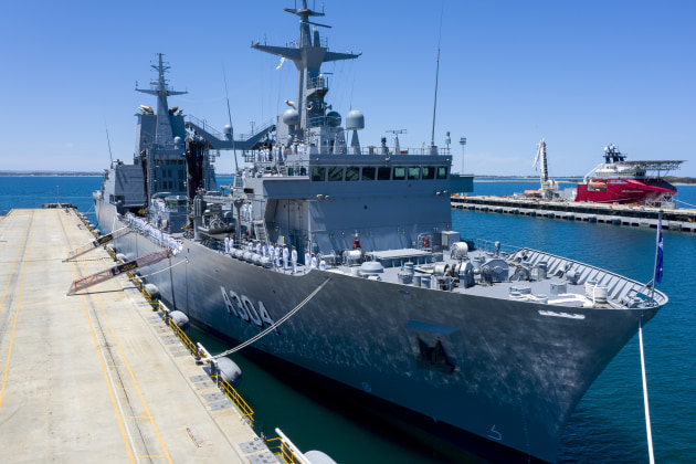 The crew of HMAS Stalwart line the ship's upper decks during its commissioning ceremony. (Defence)