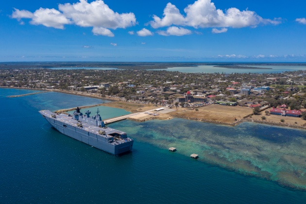 HMAS Adelaide sits alongside Nuku'alofa. (Defence)