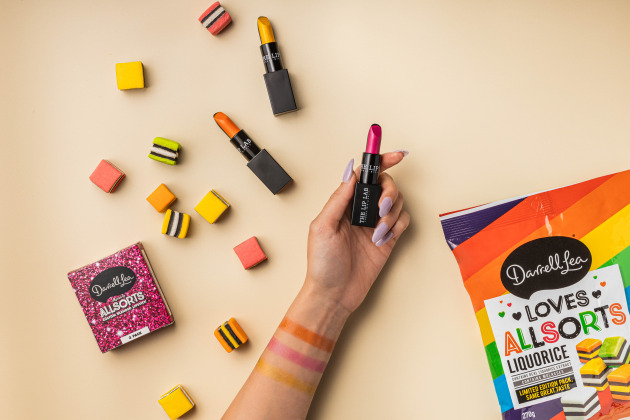 Food and beverage companies have come to the party with the Sydney Gay and Lesbian Mardi Gras running until 6 March. 
Darrell Lea has rebranded its Liquorice Allsorts to Darrell Lea Loves Allsorts and partnered with The Lip Lab for Allsorts colour inspired lipsticks. (Image source: Darrell Lea)