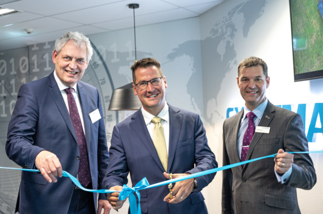 (L to R) Founder & CEO, Michael Holm, Senator Zed Seselja, and Vice President AsiaPacific Region, David Horton, at the ribbon cutting. (Systematic)