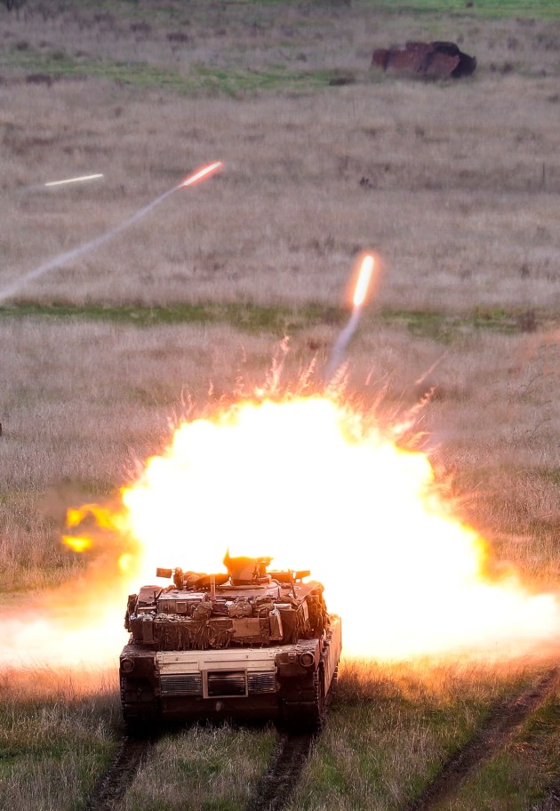 An Australian Army M1A1 Abrams Main Battle Tank fires its main armament during Exercise Gauntlet Strike at Puckapunyal Military Training Area. (Defence)