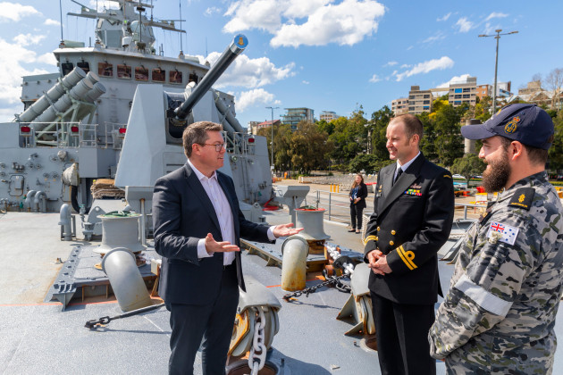 Pat Conroy receiving a briefing on the capabilities
of HMAS Parramatta from a Navy Deputy Weapons Electrical Engineering Officer at Fleet Base East. (Defence)