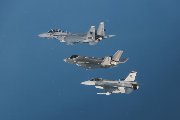 Royal Australian Air Force F-35A Lightning II and Republic of Singapore Air Force, F-16D Fighting Falcon and F-15SG Strike Eagle aircraft fly in formation over Singapore.

Credit: Defence