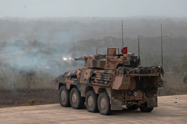 A Boxer Combat Reconnaissance Vehicle engages a target during Exercise Damascus in the Wide Bay training area.
Credit: Defence